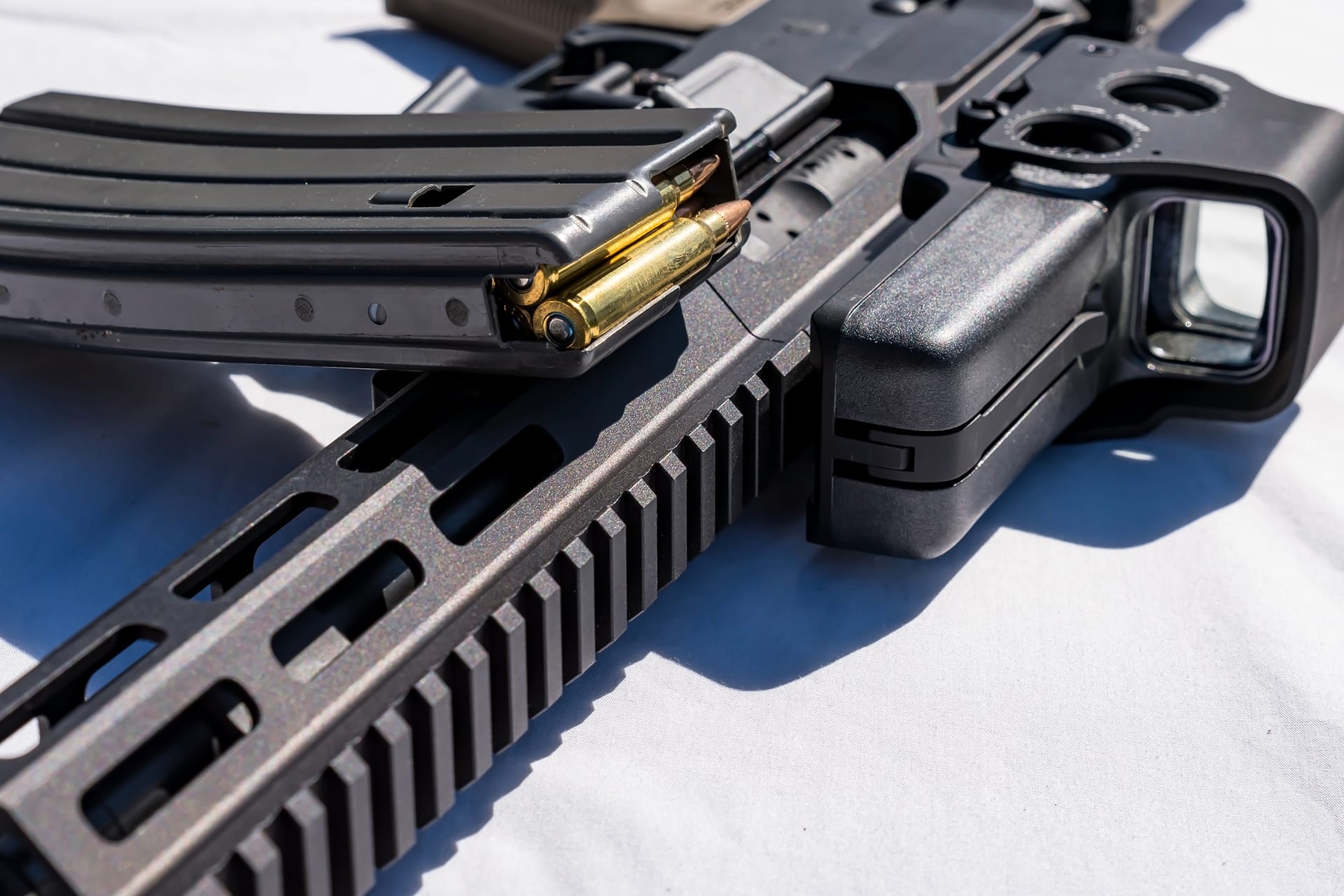 https://vigliottilaw.com/wp-content/uploads/2022/11/bigstock-A-Rifle-Magazine-Loaded-With-434242685.jpg